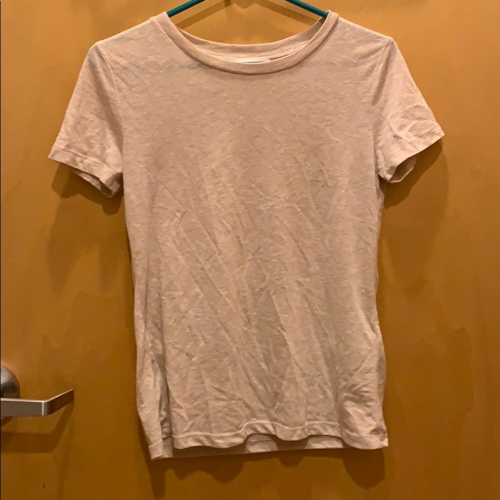 Basic tee. Very cute! Can be dressed up/down.